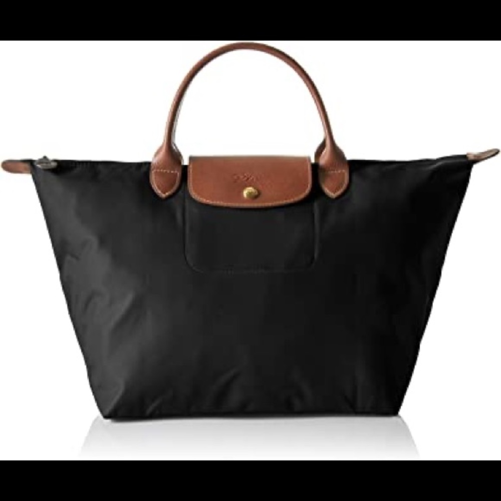 EUC medium size top handle longchamp in black.